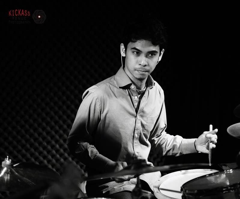 Pranayam Aquino at the drum kit